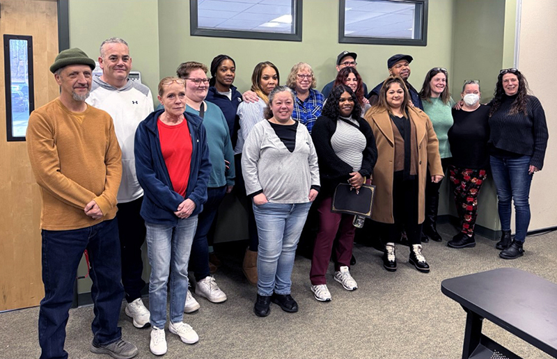 Pictured at our monthly Leadership Meeting on 12/19, Tykiesha and Carmen pose with some of our earlier FLS graduates from NHR Congratulations everyone!